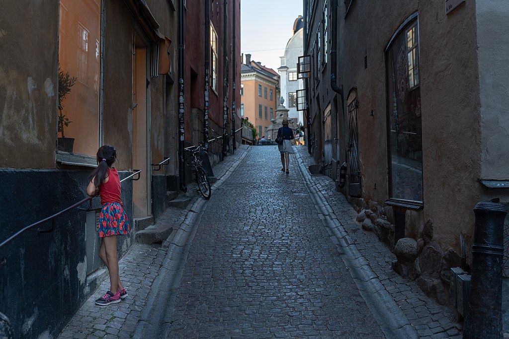 Girl in Red Stockholm Old Town