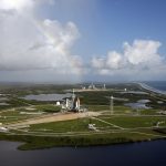 Space Shuttle Atlantis with Rainbow